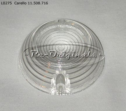 Back-up lens, NOS, clear, concave face, Carello, #11.508.716 on lens, 73mm diameter - L0275